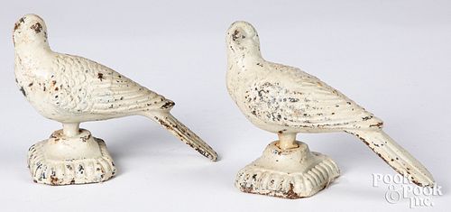 PAIR OF PAINTED CAST IRON BIRD