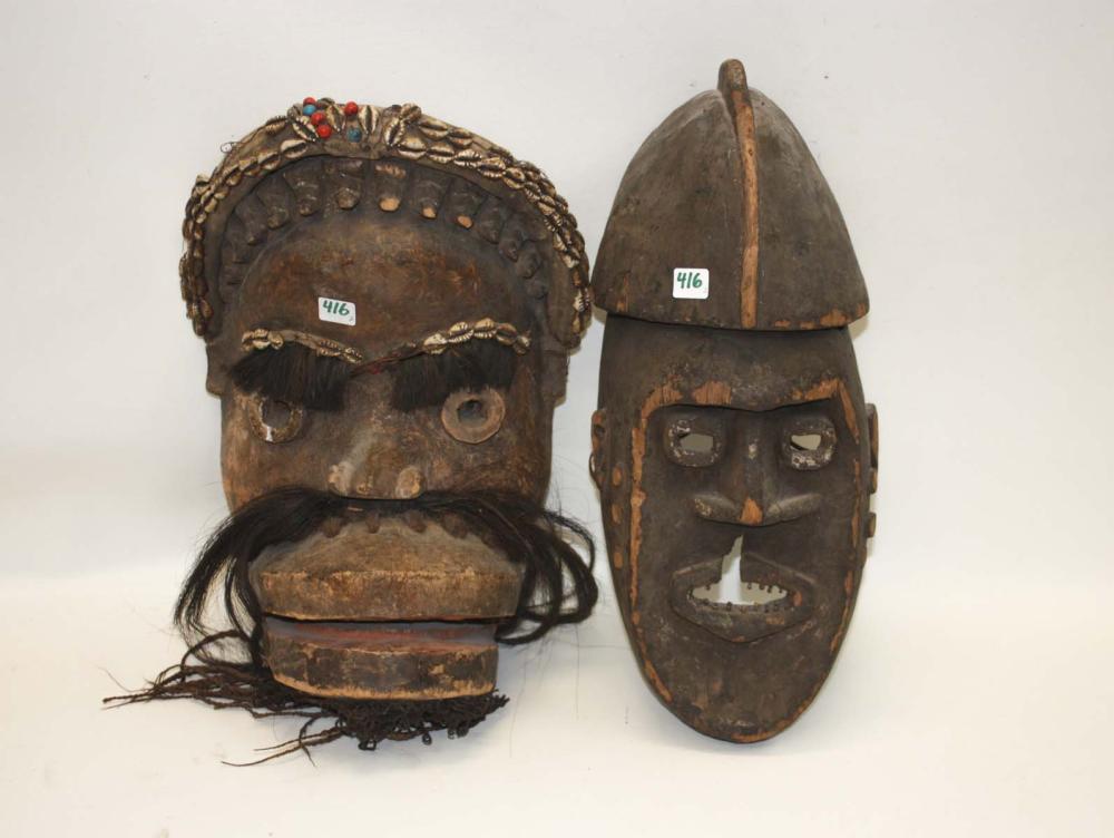 TWO AFRICAN CARVED WOOD MASKS  314fe4