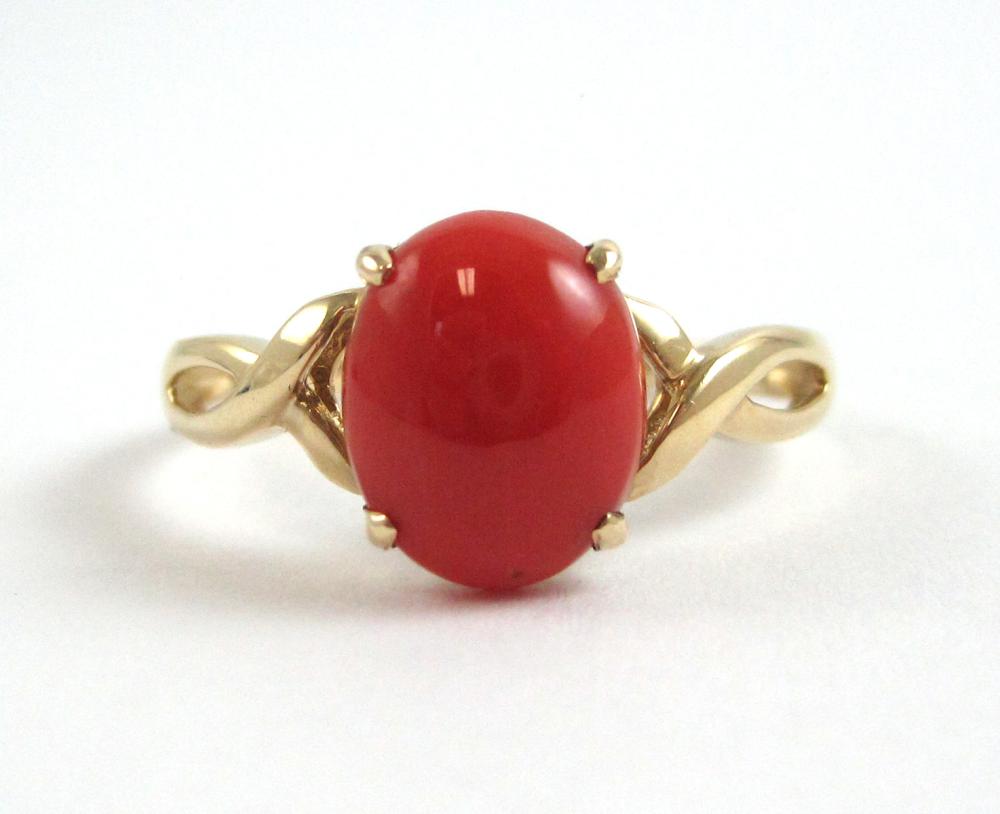 CORAL AND FOURTEEN KARAT GOLD RING  315082