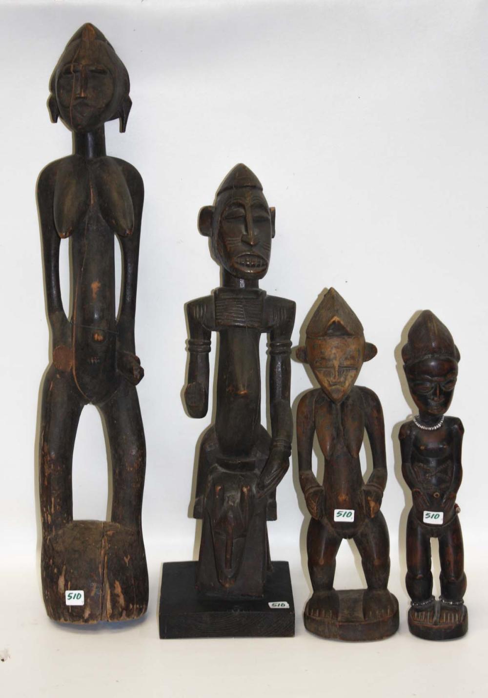FOUR AFRICAN IVORY COAST WOOD FIGURES:
