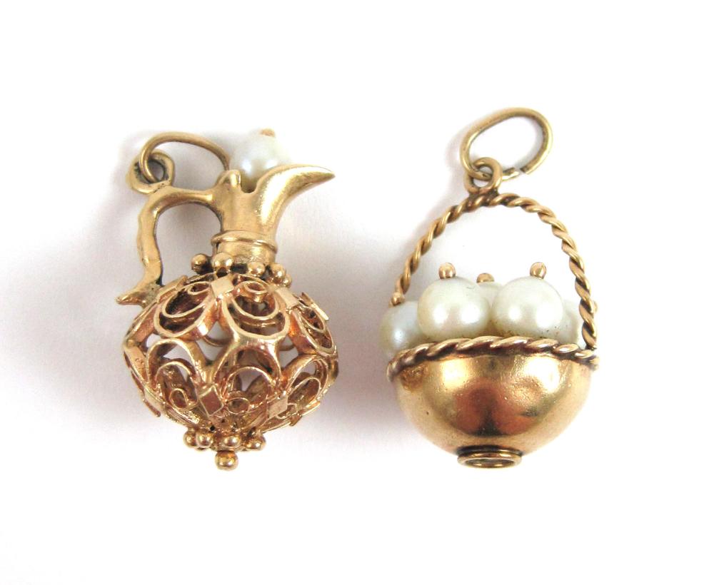 TWO PEARL AND FOURTEEN KARAT GOLD