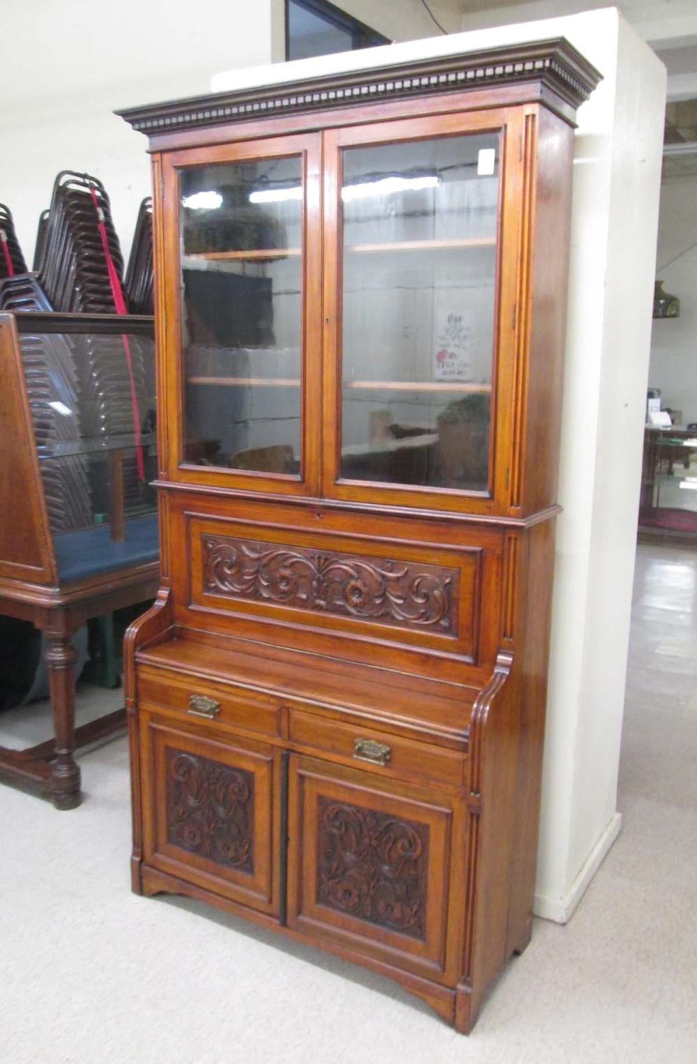 A VICTORIAN CARVED MAHOGANY SECRETARY 315248