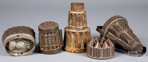 FIVE TIN FOOD MOLDS, 19TH C.Five