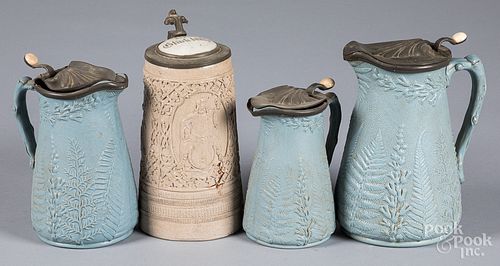 THREE STONEWARE PITCHERS AND A 31526e