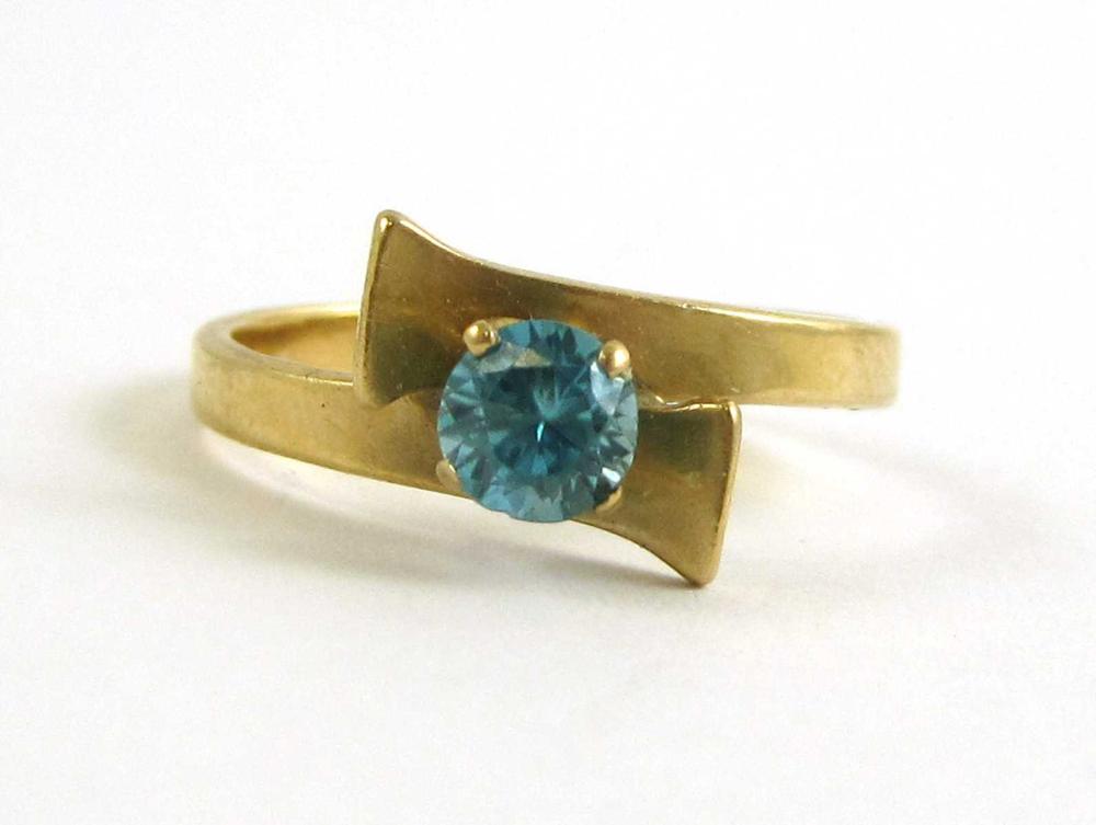 ZIRCON AND FOURTEEN KARAT GOLD 315347