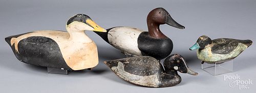 FOUR CARVED AND PAINTED DUCK DECOYSFour