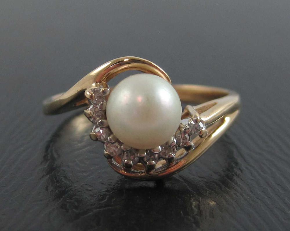 PEARL, DIAMOND AND FOURTEEN KARAT GOLD