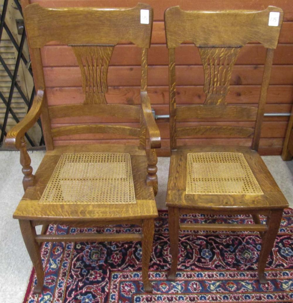 A SET OF FOUR OAK DINING CHAIRS,