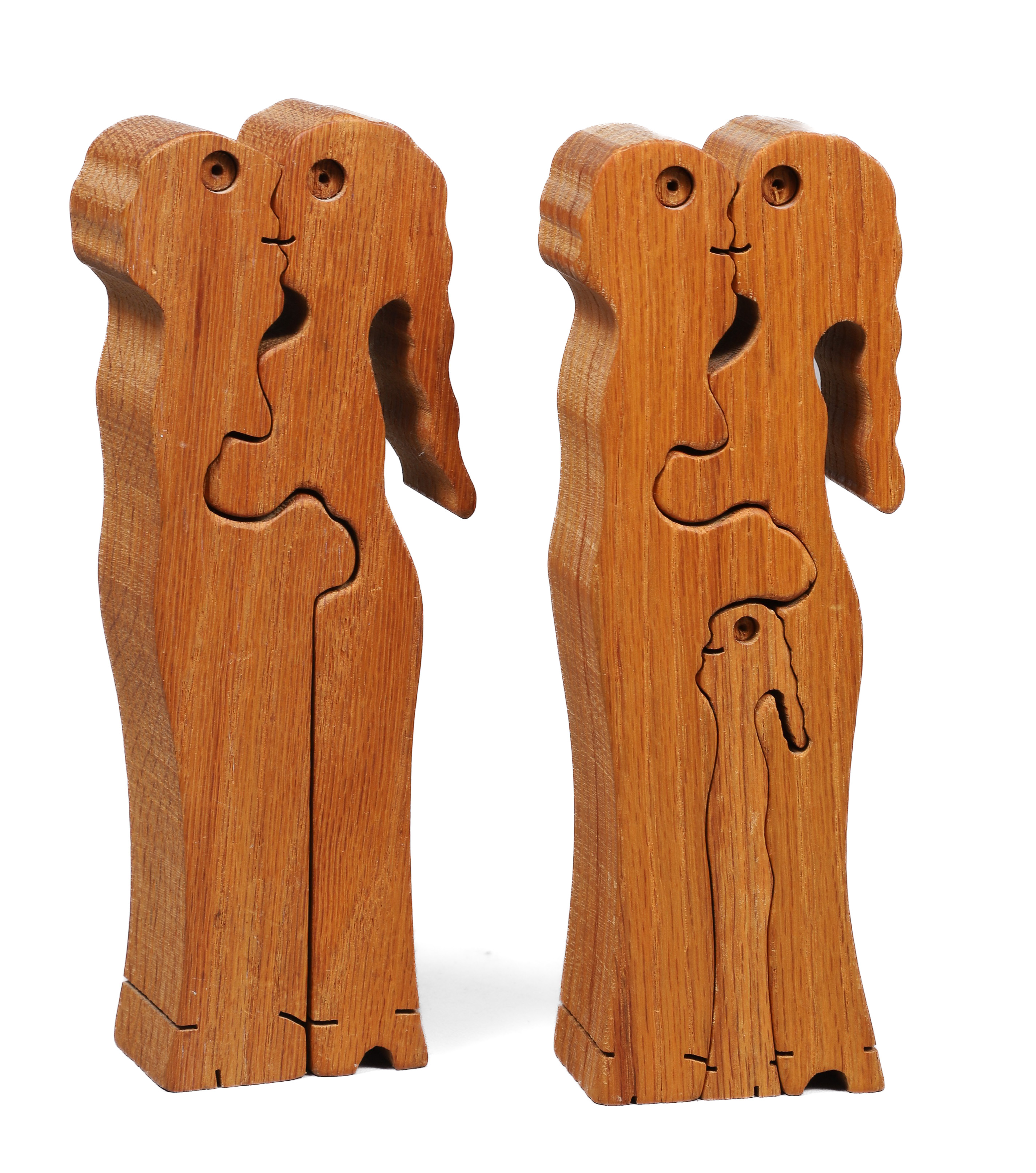 (2) Bob Ameri oak puzzle sculptures,