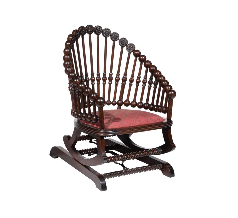 CARVED MAHOGANY ROCKING CHAIR,