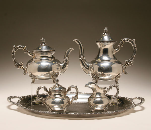 Ornate silverplate tea and coffee service;