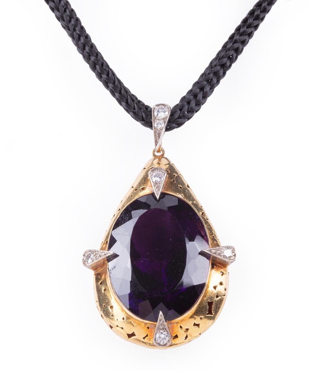 18 KT YELLOW GOLD AMETHYST AND 3181e7