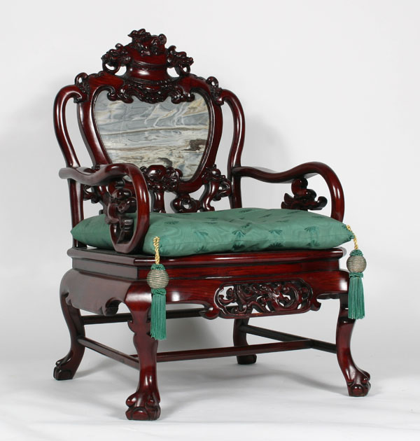 Chinese low chair with carved geometrics 4f378