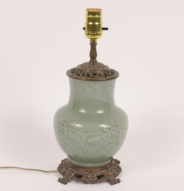 Celadon lamp; continuous floral pattern,