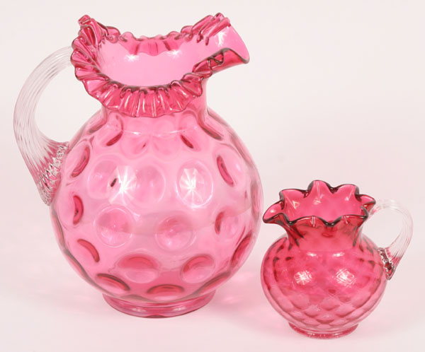 Cranberry glass pitchers; coinspot pitcher