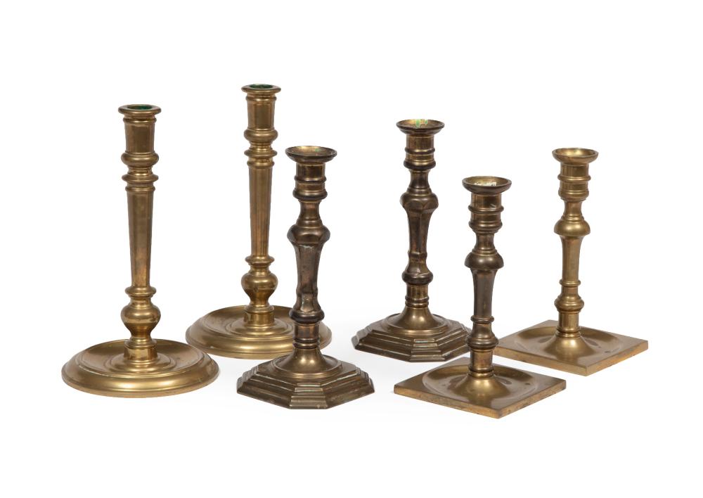 GEORGIAN-STYLE BELL METAL CANDLESTICKSThree