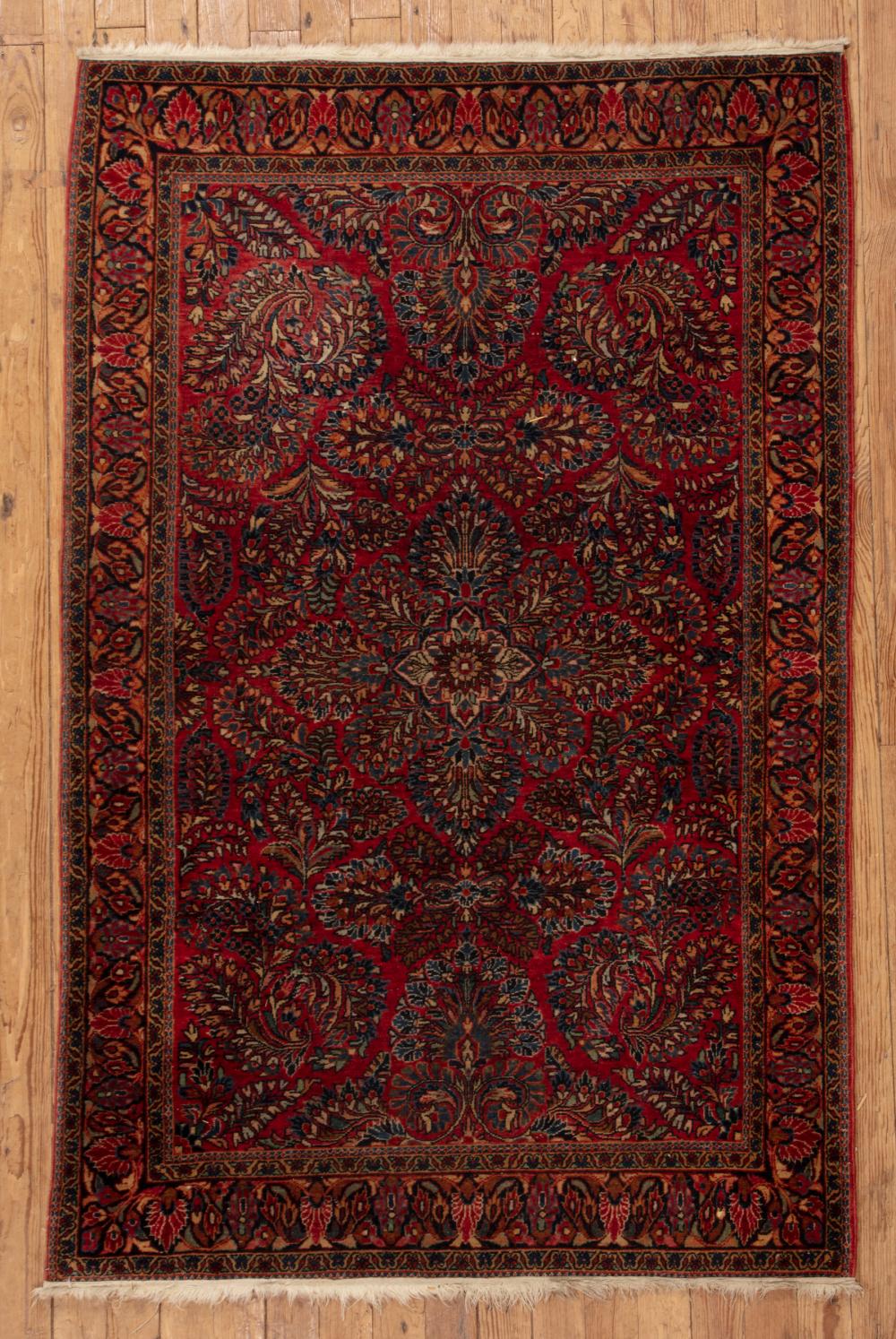 PERSIAN RUGPersian Rug, red ground,