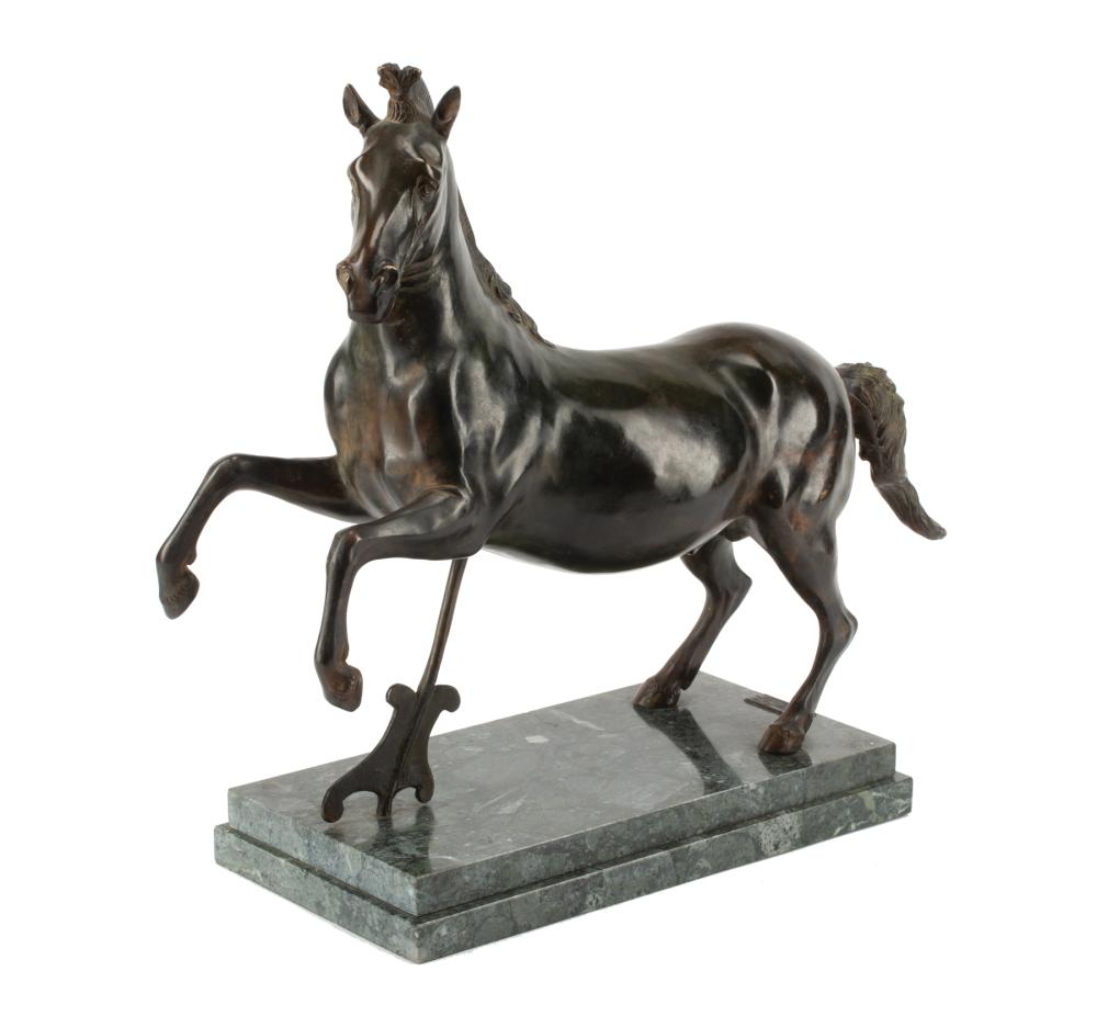 BRONZE FIGURE OF A PRANCING HORSEBronze