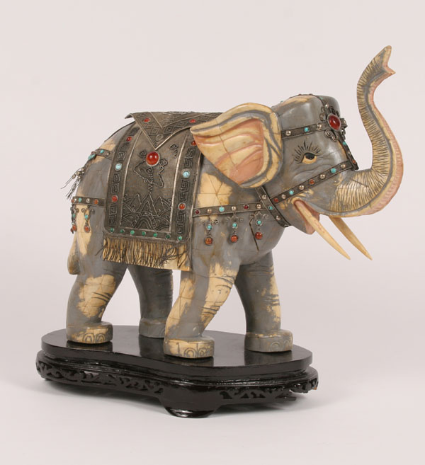 Asian painted elephant on stand with