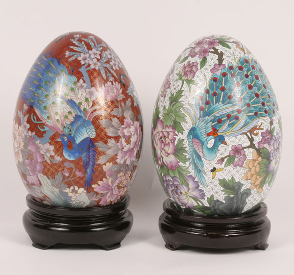 Two cloisonne eggs on stands, elaborate
