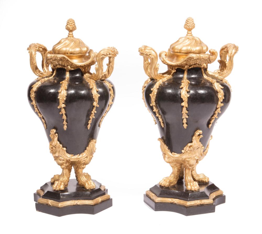 PARCEL GILT VENEERED BLACK MARBLE COVERED