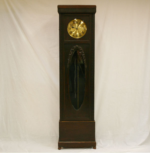 Oak tall case clock, footed, brass