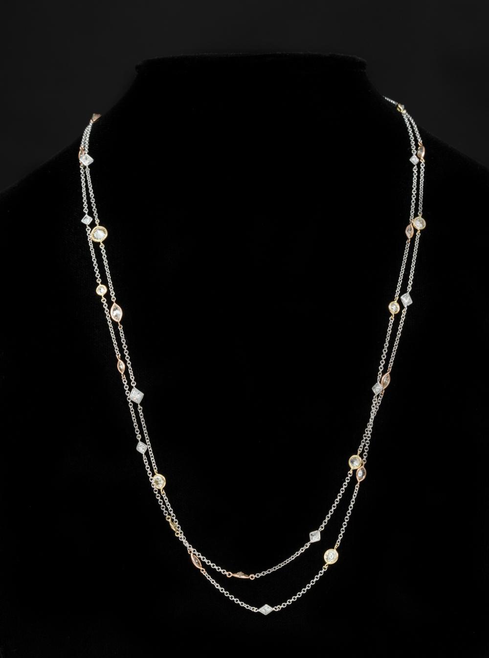 18 KT. GOLD AND DIAMOND NECKLACE18