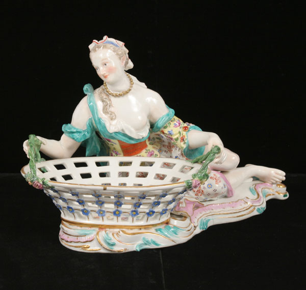 Meissen? porcelain figure of a seated