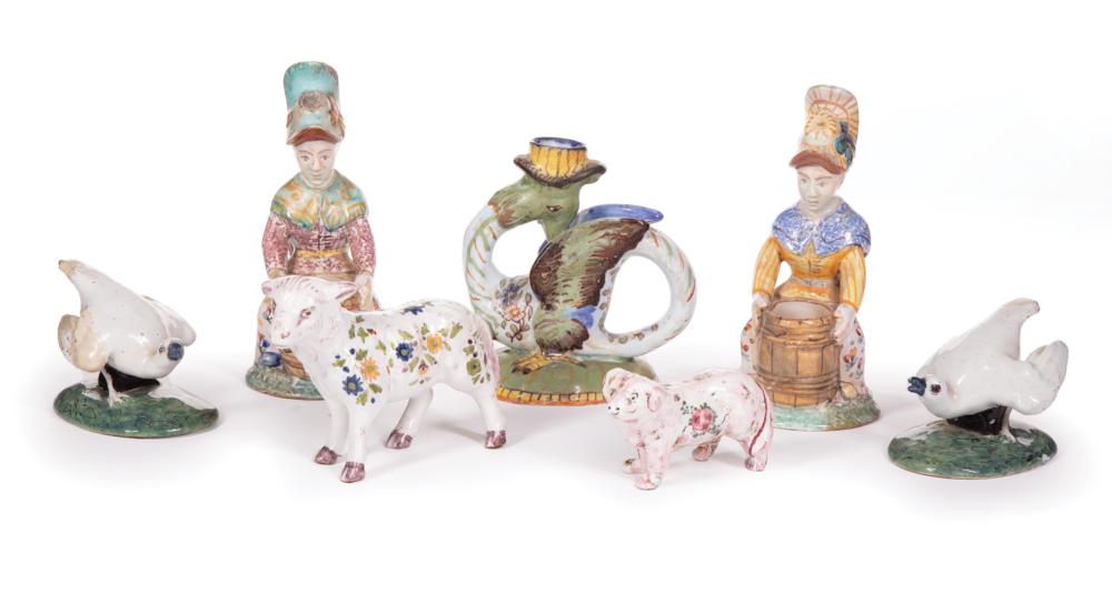 SEVEN CONTINENTAL FAIENCE FIGURINESSeven
