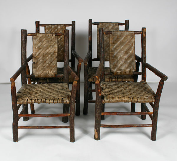 Set of four Old Hickory arm chairs;