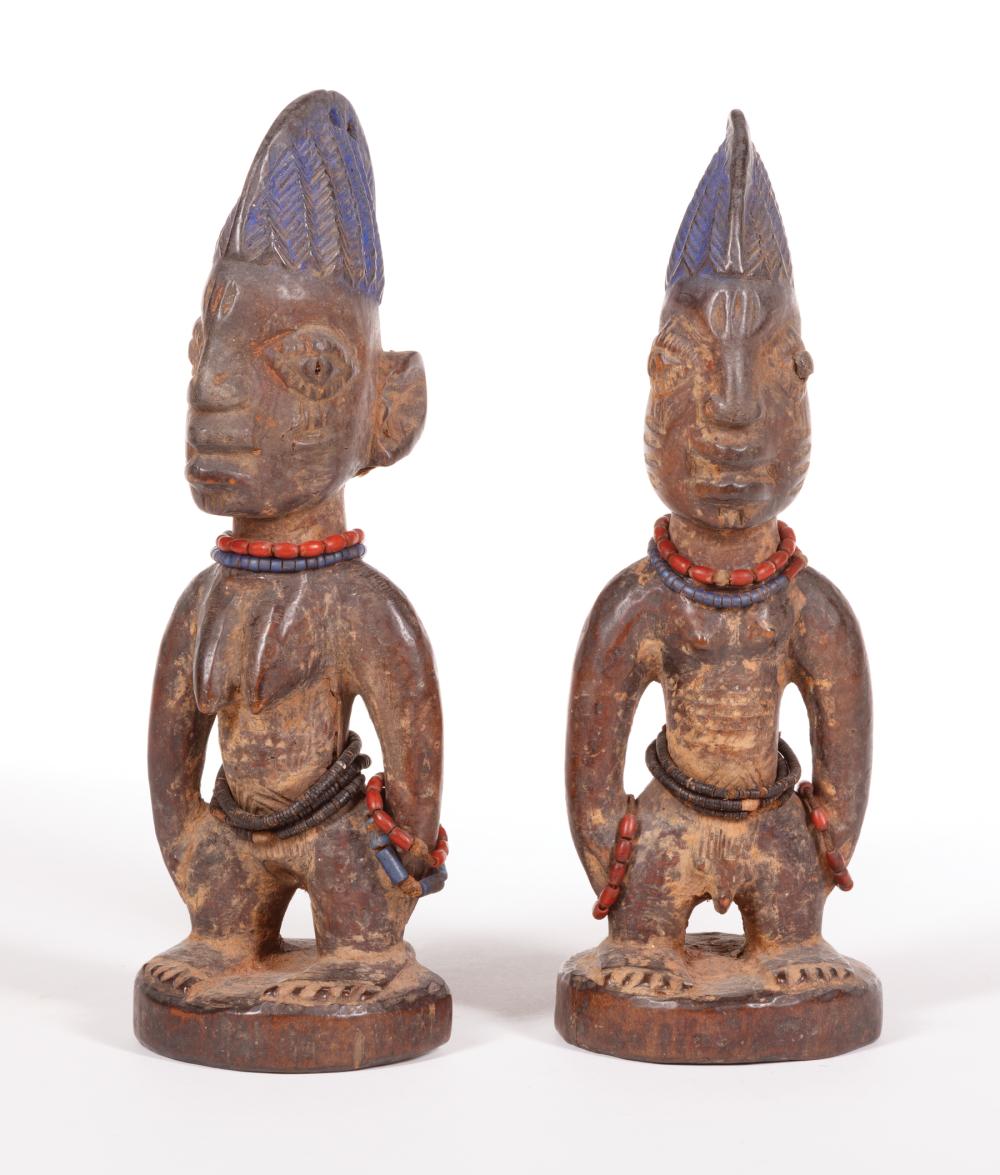 TWO AFRICAN CARVED WOOD IBEJI OF