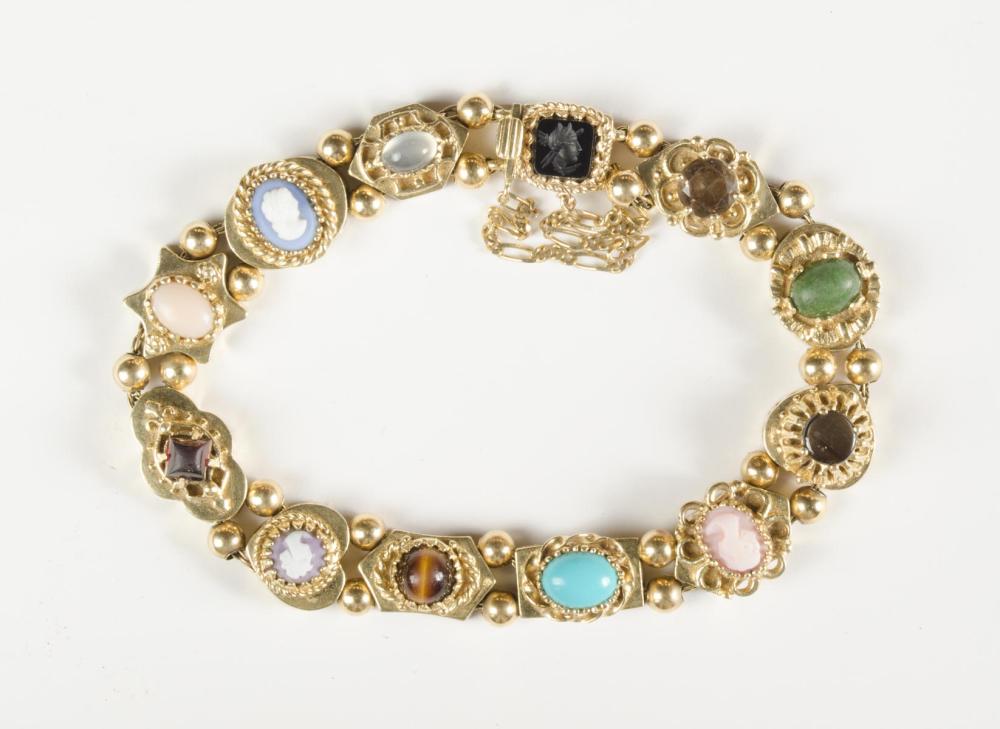 COLORED GEMSTONE AND FOURTEEN KARAT