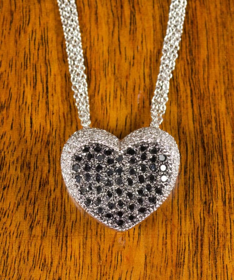 BLACK AND WHITE HEART PENDANT NECKLACE.