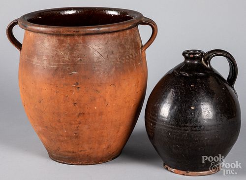 TWO PIECES OF REDWARE, 19TH C.Two pieces