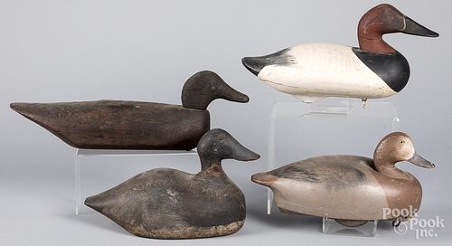 FOUR CARVED AND PAINTED DUCK DECOYSFour