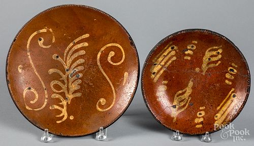 TWO SLIP DECORATED REDWARE PLATESTwo