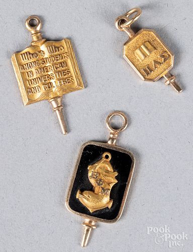 THREE 10K GOLD AND ENAMEL PENDANTSThree 31752c