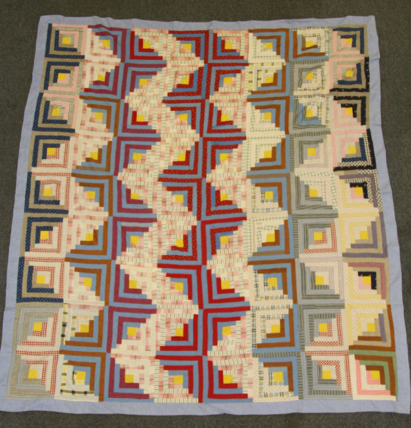 Three hand sewn quilts; log cabin,