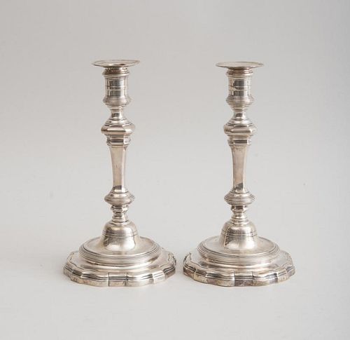 PAIR OF RÉGENCE SILVER CANDLESTICKSThree