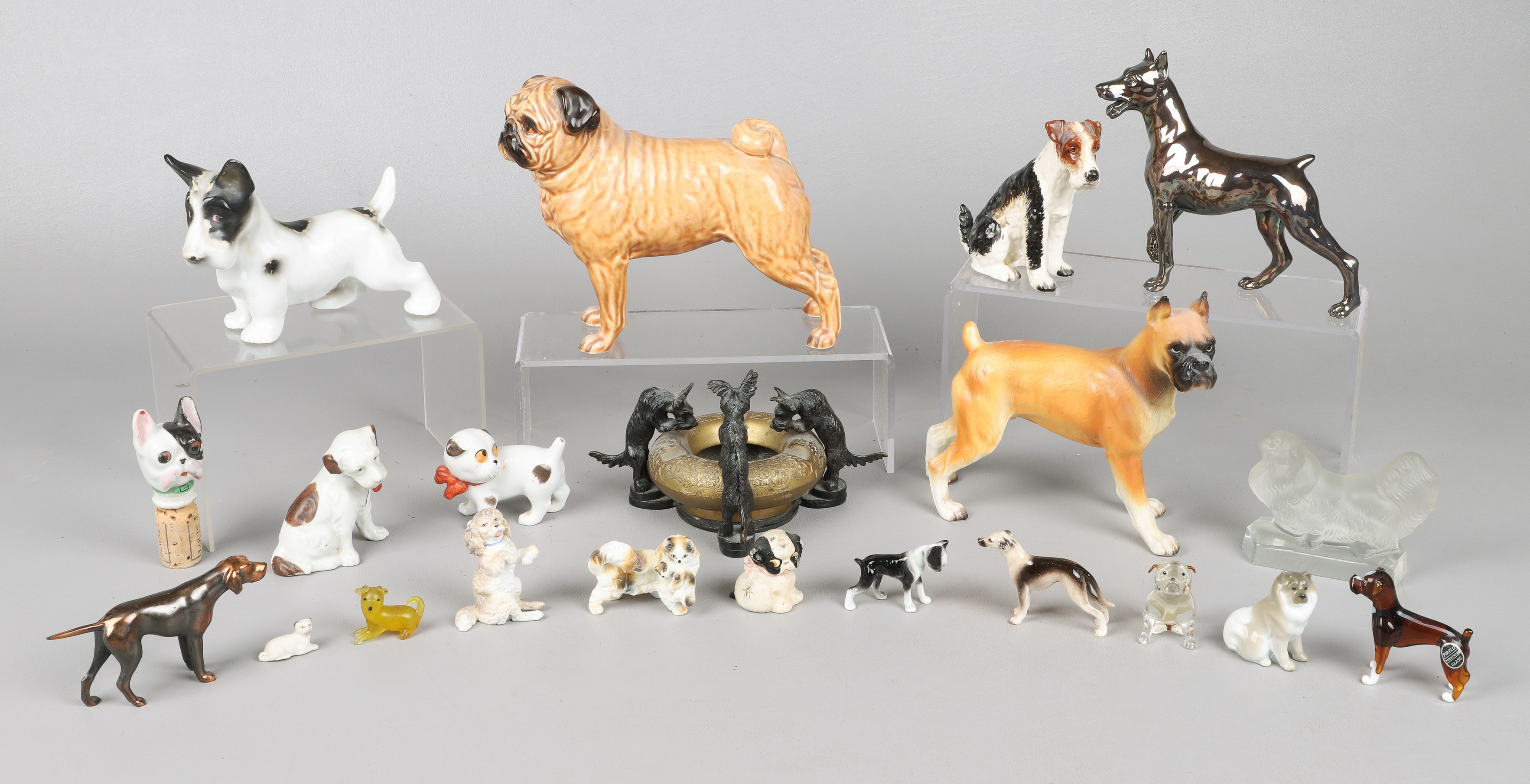 Lot of dog figurines, including