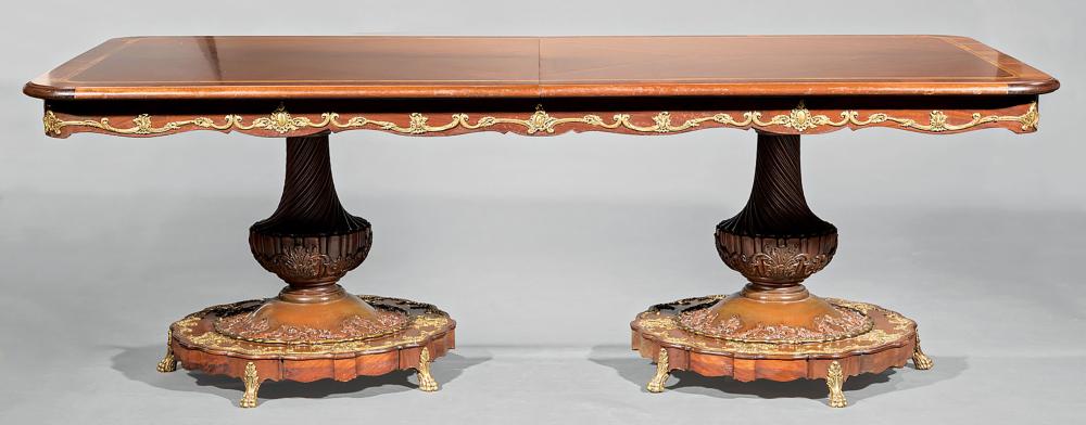CARVED , BRONZE-MOUNTED MAHOGANY DINING
