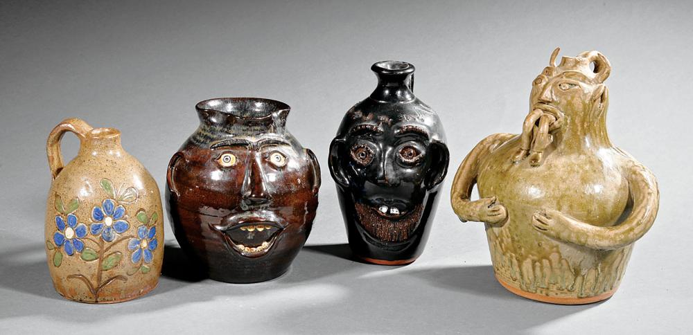 FOUR STONEWARE FIGURAL JUGSFour Stoneware