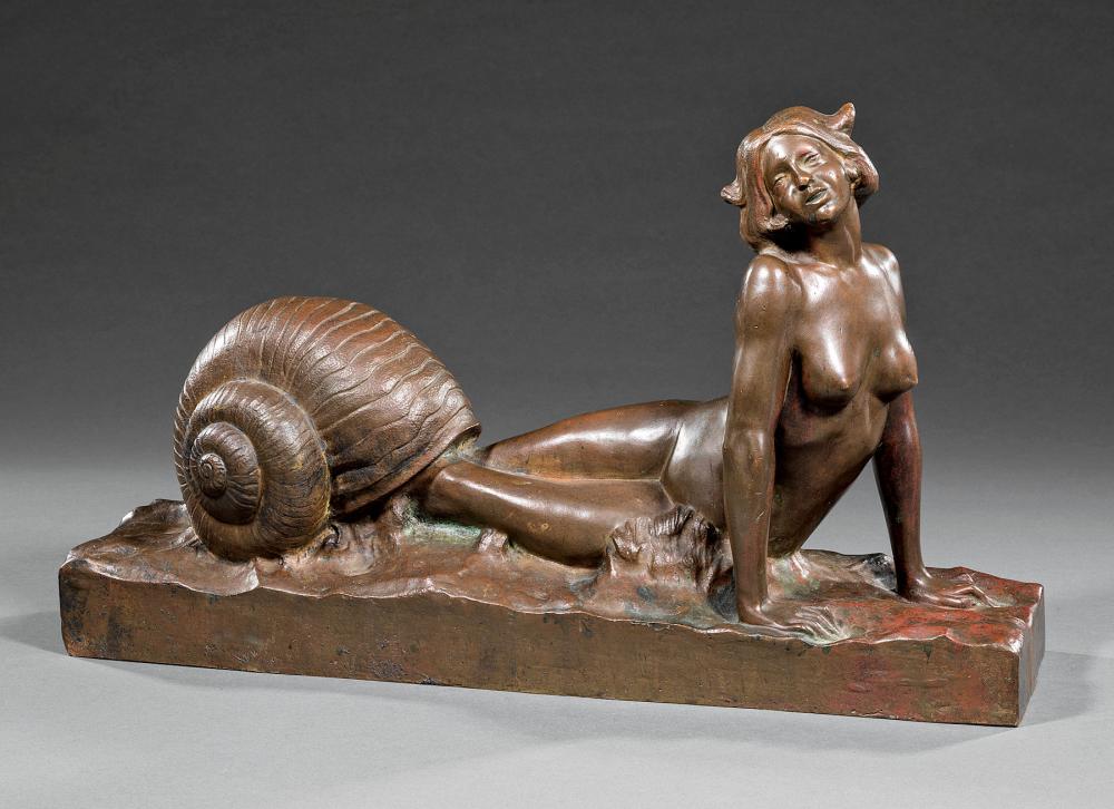 BRONZE FIGURE OF A WOMAN WITH SHELLBronze