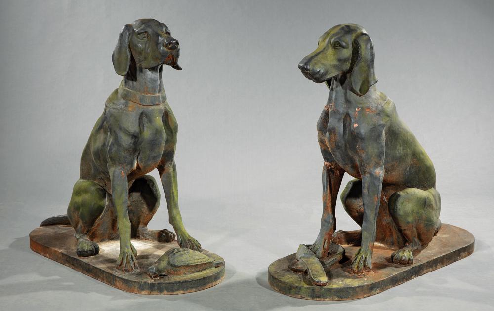 PAIR OF CAST IRON FIGURES OF HUNTING