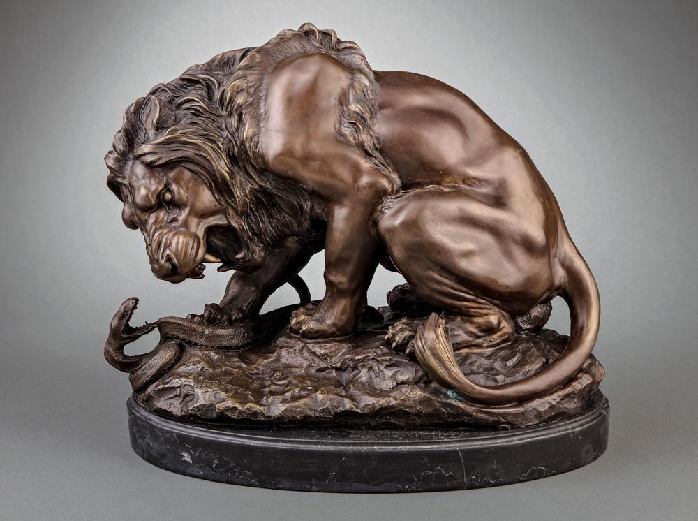 BRONZE FIGURAL GROUP OF A LION 31afdb