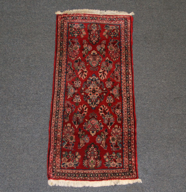 Hand loomed oriental rug. 52" x