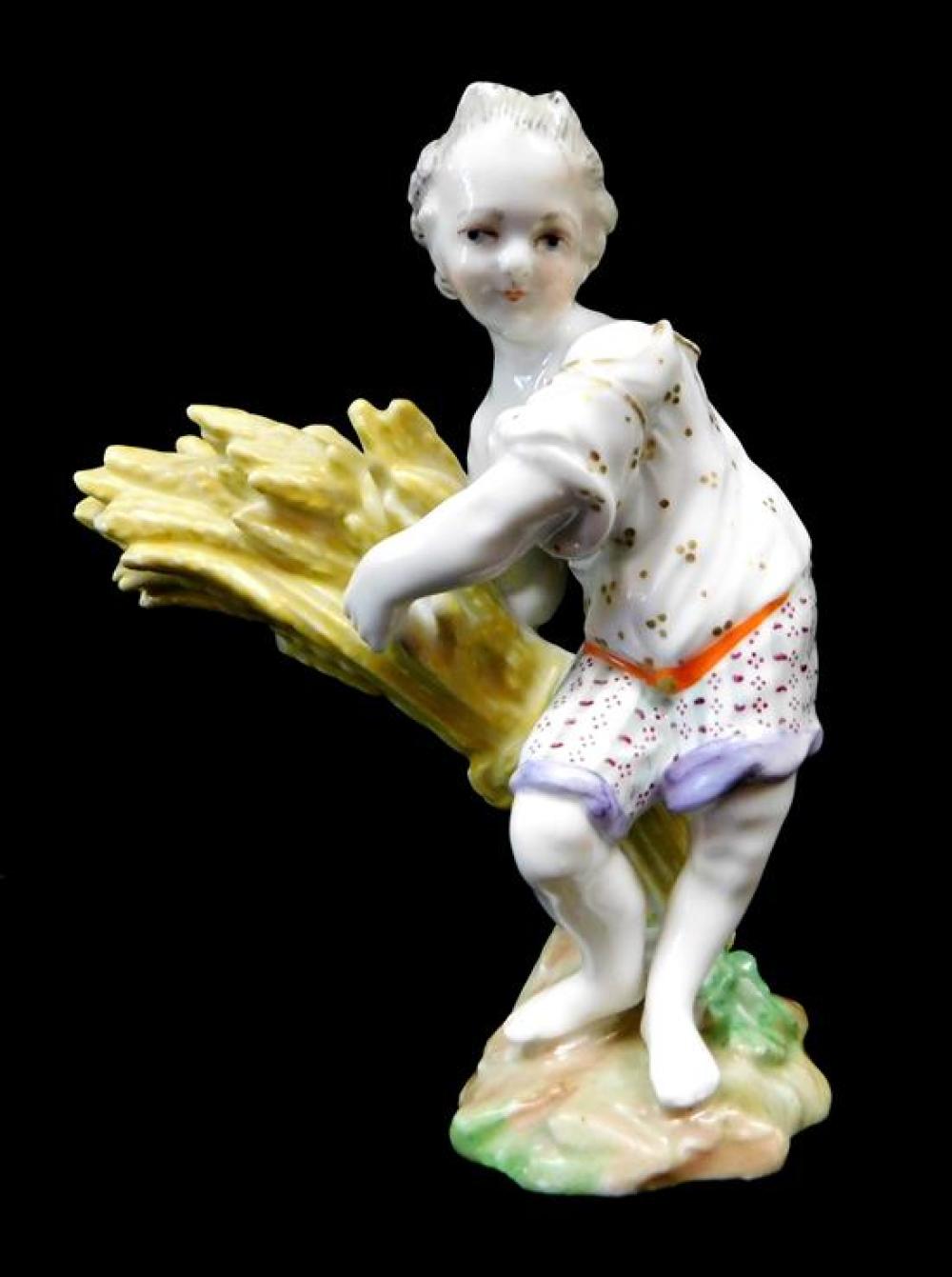 EARLY MEISSEN FIGURE OF GIRL GATHERING