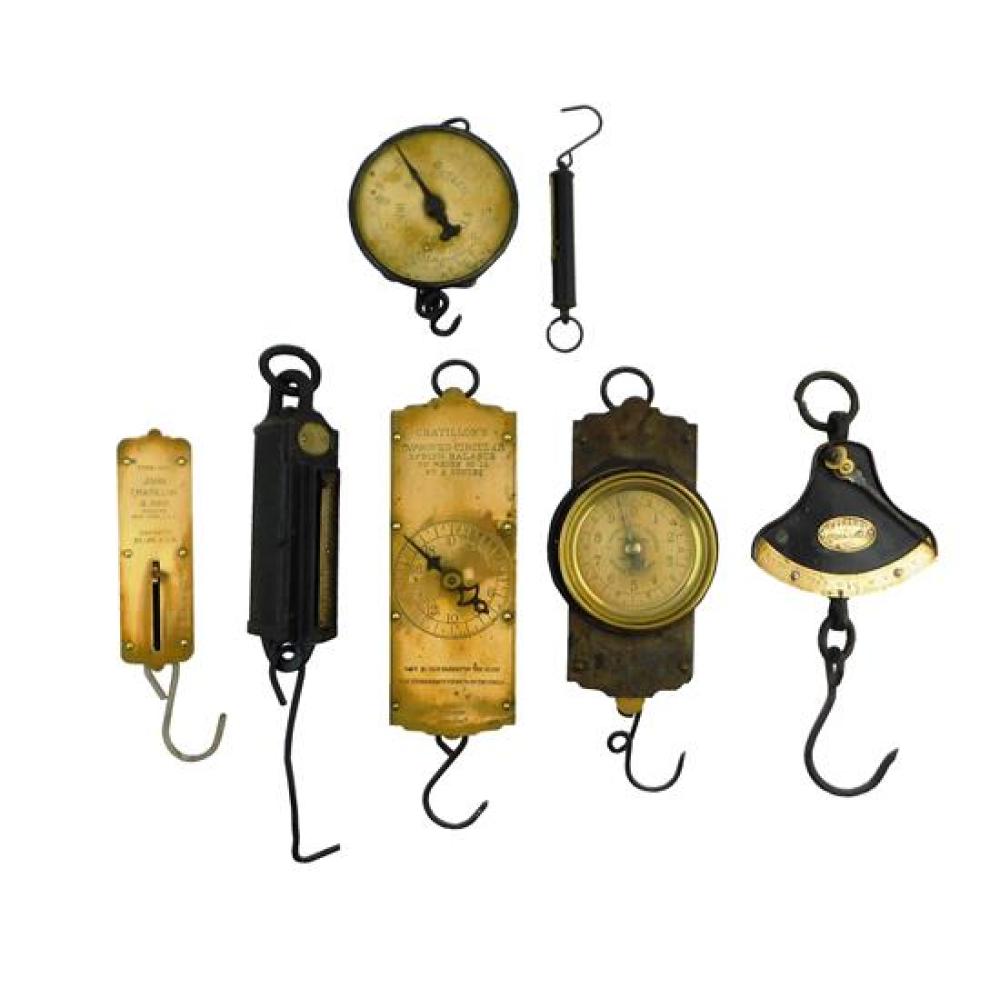 SEVEN BRASS AND IRON HANGING SCALES