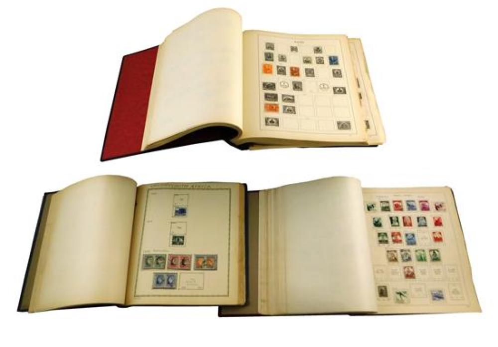 THREE EUROPEAN STAMP ALBUMS WITH