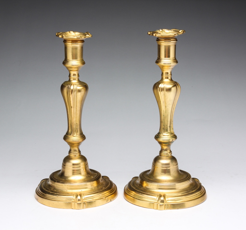 A PAIR OF LOUIS XV GILDED CANDLE